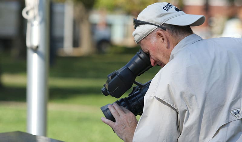 Quincy Illinois History Museum - man recording video b-roll footage for interactive display